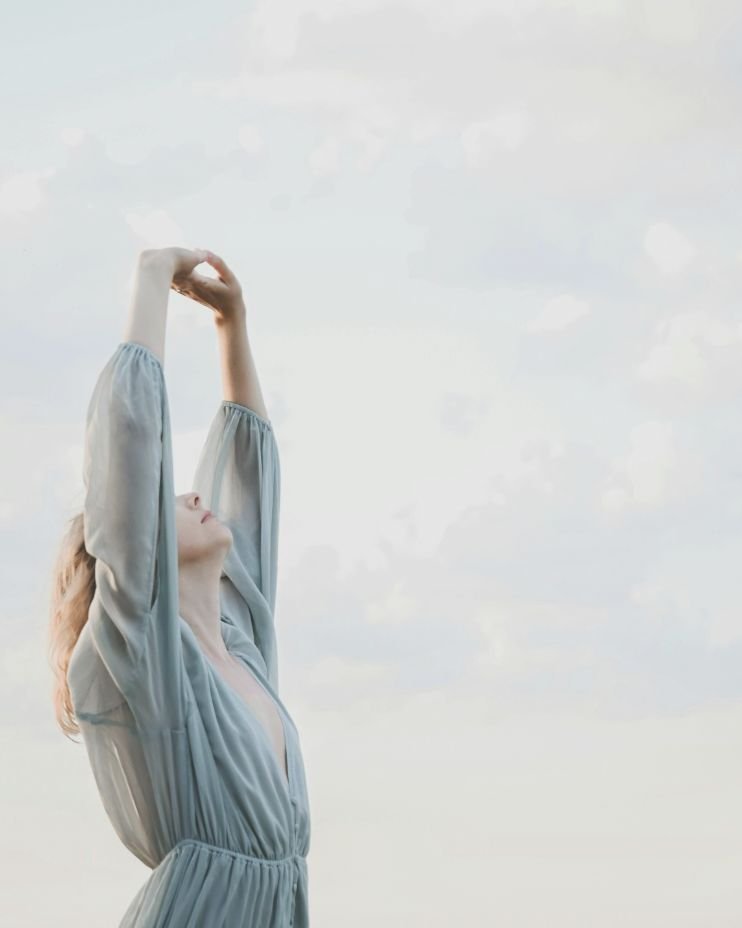 Soft fabric movement against a blue sky